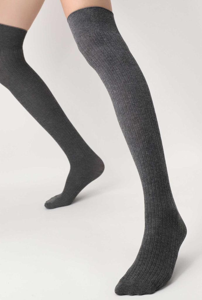 Lady's legs standing apart, wearing long, over the knee grey rib socks.